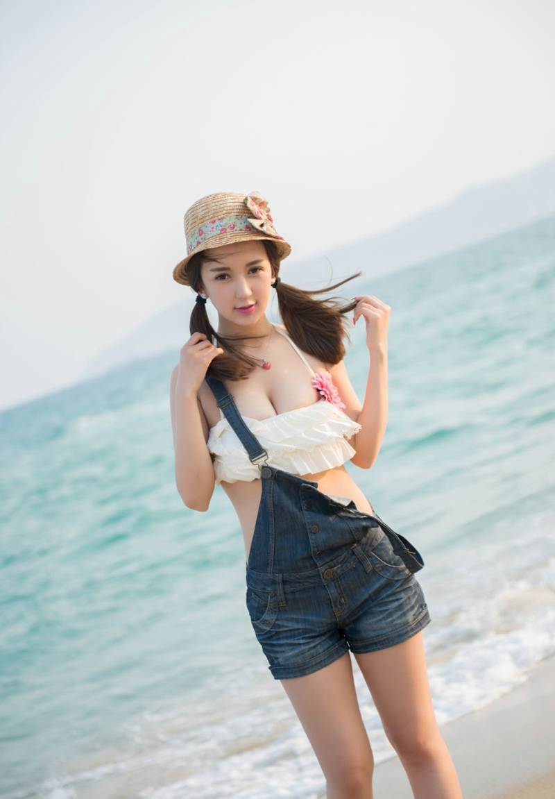 牛仔裤马尾辫可爱妹子美胸性感写真-10